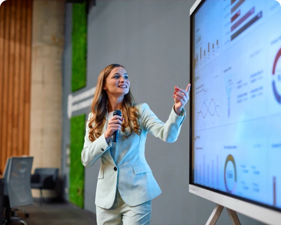 Professional speaker discussing graphs and charts